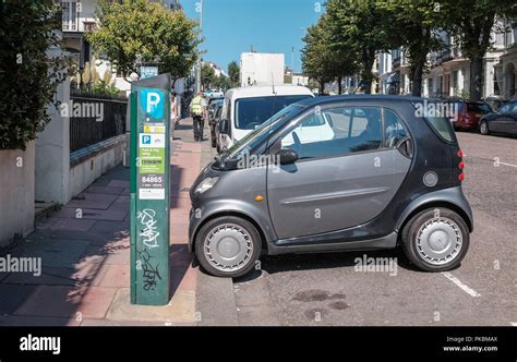 Cars parked sideways on hi-res stock photography and images - Alamy