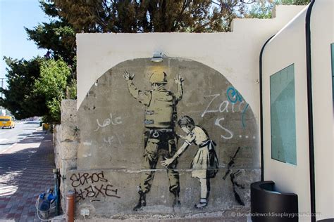 Banksy in Bethlehem! Banksy Street Art, Bethlehem, Palestine | The Whole World Is A Playground