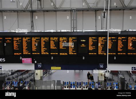 train timetable display at waterloo station Stock Photo - Alamy