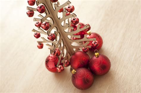 Photo of Christmas tree decorated with red festive baubles | Free christmas images