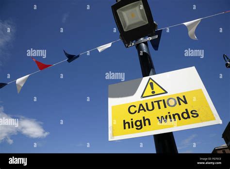 High winds warning sign Stock Photo - Alamy