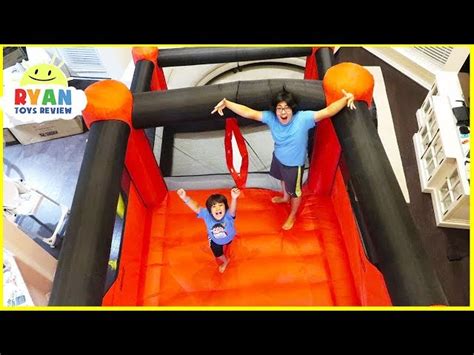 Giant Inflatable indoor bounce House with Slides in our living room ...