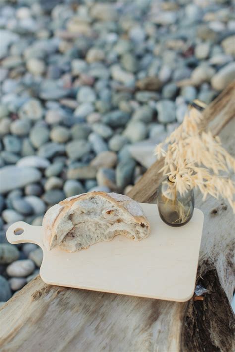 White Wooden Chopping Board With White and Brown Stone · Free Stock Photo