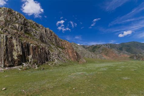 Premium Photo | Mountain landscape with clouds.