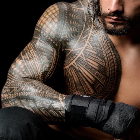 The 50 coolest tattooed Superstars in WWE history | Roman reigns tattoo, Roman reigns, Tribal ...