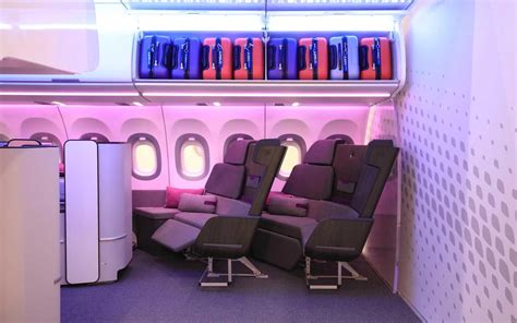 the inside of an airplane with several seats