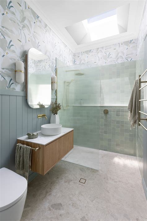 A stunning sage green bathroom transformation with wallpaper - The Interiors Addict