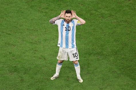 Messi celebrates a Riquelme-style goal against the Netherlands in front ...