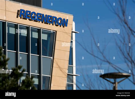 A logo sign outside of the headquarters of Regeneron Pharmaceuticals ...