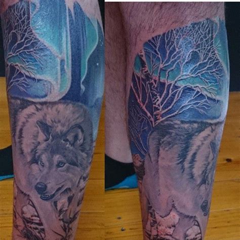 northern lights wolf tattoo - howtocutbangsathomefaceshapes