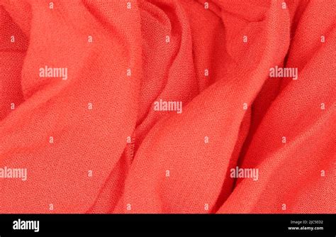 Close-up red fabric texture background Stock Photo - Alamy