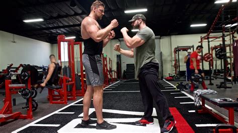 WATCH: Bradley Martyn Squatting 7' 2" Dutch Giant Olivier Richters – Fitness Volt