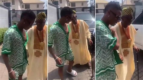 Rare video Of Wizkid holding his aged father melts hearts