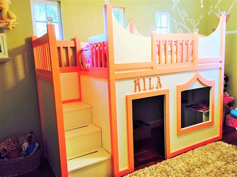 Princess playhouse loft bed with storage stairs and additional storage accessed from playhouse ...