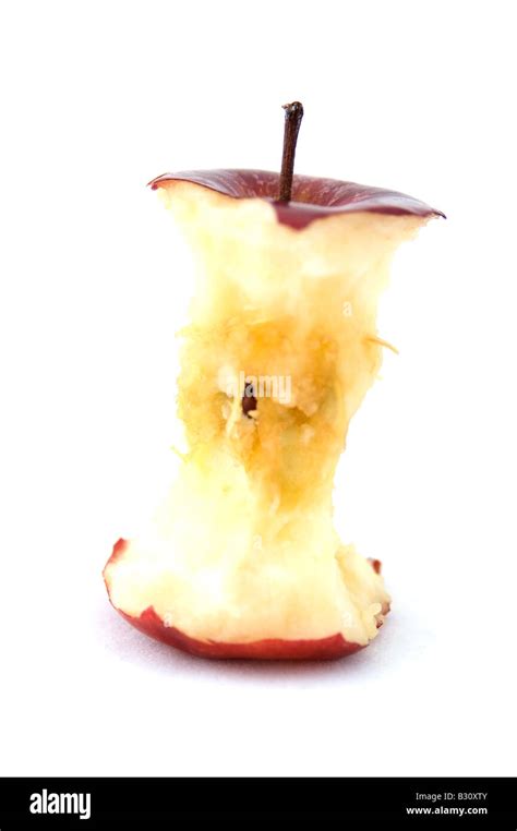 An apple core from a red apple Stock Photo - Alamy