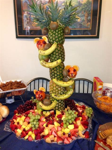 My husband's super cute Pineapple tree! Baby... | Jungle baby shower theme, Jungle baby shower ...