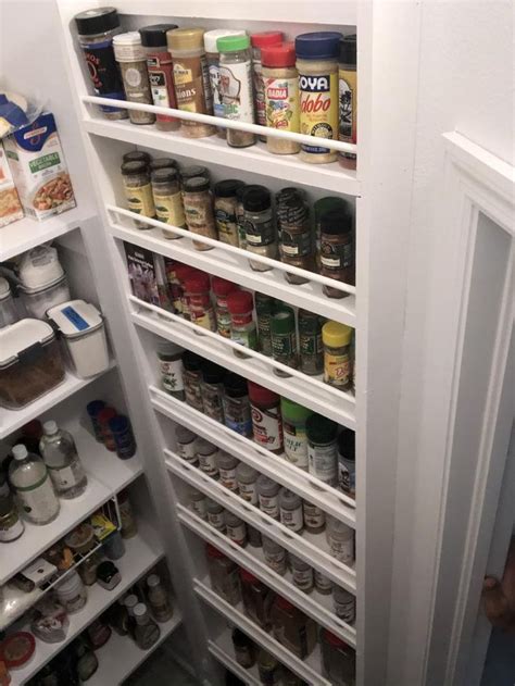 an open pantry with lots of food in it