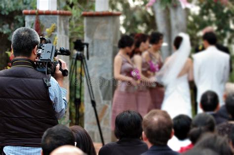 Wedding Videographer stock photo. Image of videographer - 1731946