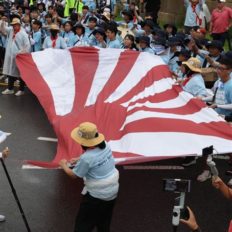 South Koreans rip Japan flag in protest against Fukushima water ...