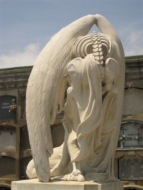 Poblenou Cemetery's Breathtaking 'Kiss of Death' Sculpture