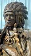 7FT TEAK WOOD CARVED NATIVE AMERICAN STATUE - Earl's Auction Company