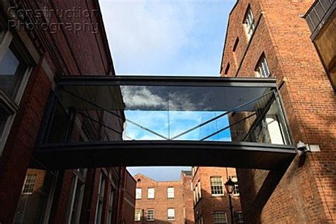 elevated glass walkways between buildings | Elevated walkway between two buildings | Glass ...