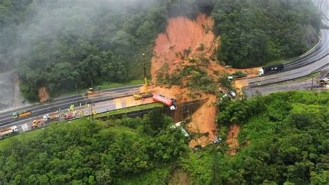 Rescuers search for missing 30 believed buried under Brazil landslide | ITV News