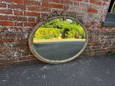 A Fabulous Antique French 19th C painted Oval Mirror.