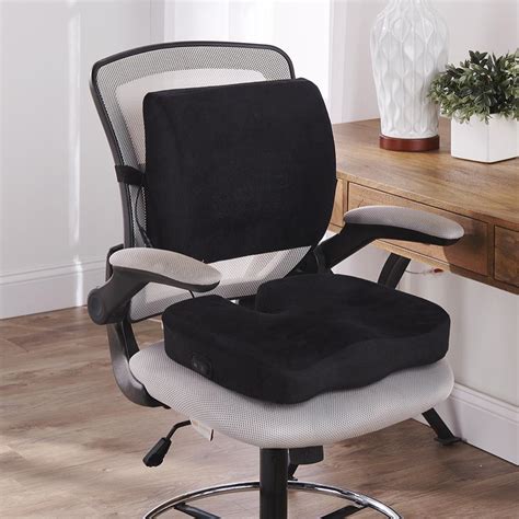 The Heated Massage Seat And Lumbar Cushion - Hammacher Schlemmer