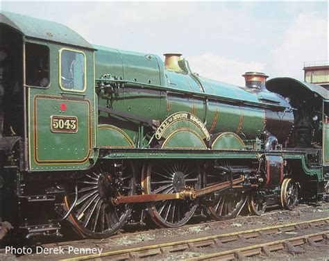 GWR Castle Class No. 5043 Earl of Mount Edgcumbe races alongside the M5 motorway in Devon with ...