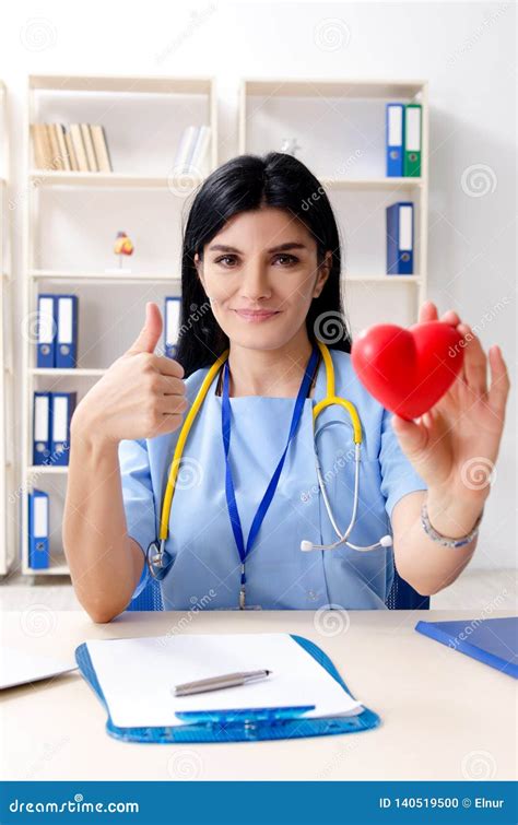 The Female Doctor Cardiologist Working in the Clinic Stock Photo - Image of lecturer ...