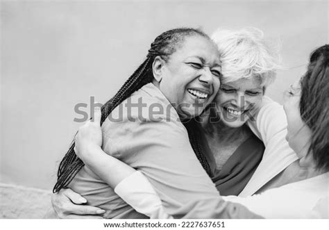 Happy Diverse Senior People Hugging Each Stock Photo 2227637651 ...