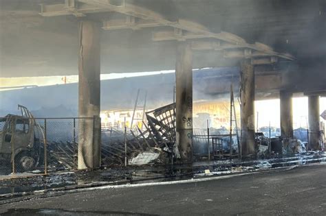 Massive pallet fire shuts down L.A. freeway interchange indefinitely