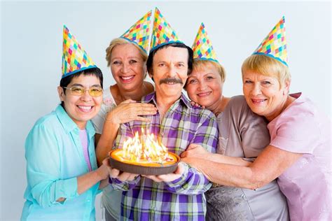 Seniors on a Birthday Party Stock Photo - Image of person, decoration: 102170020