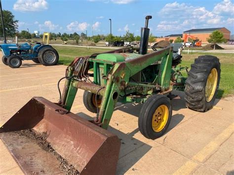 John Deere 2040 Tractor w/145 Loader Attachment | AllSurplus