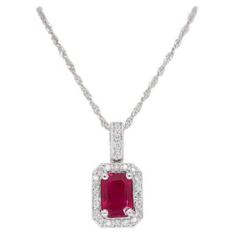 Ruby and Diamond Halo Pendant Necklace at 1stDibs