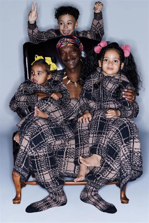 Snoop Dogg gets cozy alongside wife, kids and grandkids in rare family pics for Skims