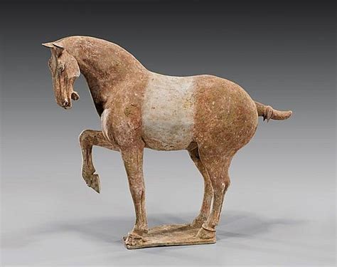 LARGE TANG POTTERY SADDLED HORSE Finely modeled, Chinese Tang Dynasty unglazed pottery, large ...