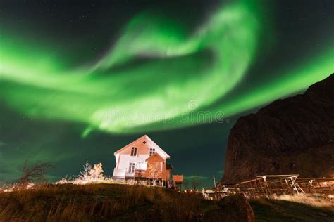 Northern Lights Over the Reine Fishing Village, Lofoten Islands Stock ...