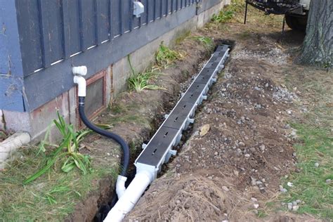 Installation of channel drain system (Dura Slope by NDS) for in-ground gutter system. | Backyard ...