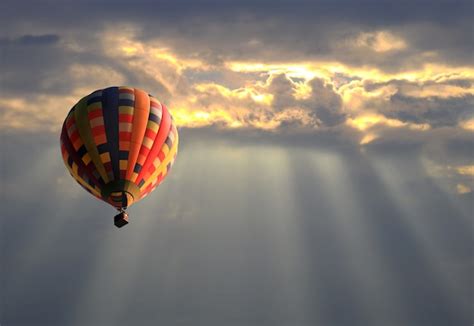 Premium Photo | Hot air balloon in the sunset sky