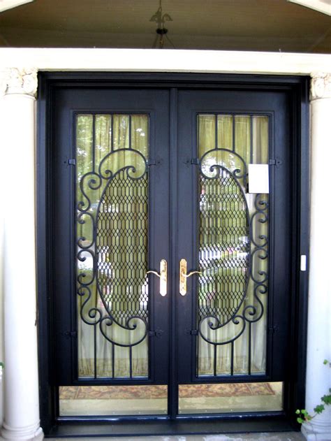 two panels security door in black frame and crafted glass screen | Unique house design, Wrought ...