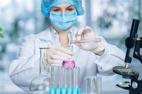 A Laboratorian Assistant Holding The Blood Testing Lab Researching Equipment Stock Image - Image ...