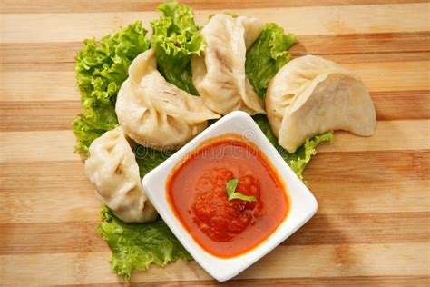Vegetarian Momos with Tomato and Chili Sauce Stock Photo - Image of ...
