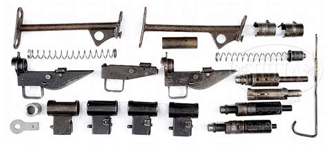 Sold Price: BRITISH MACHINE GUN PARTS KIT LOT W/THREE STEN AND THREE ...