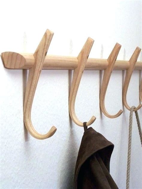 unfinished wood coat rack via wooden pegs peg wall mounted | Wooden coat hooks, Wooden coat rack ...