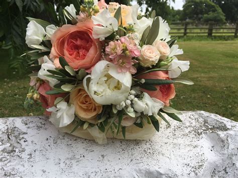 Flowers By Becca Jane created this bridal bouquet with gorgeous peaches ...