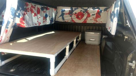 I created a bed in the back of my pickup truck out of PVC. There's plenty of storage underneat ...