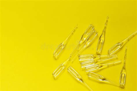 Ampoules on a Yellow Background. Stock Photo - Image of vaccination, pharmacology: 207875398