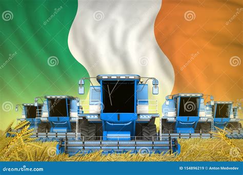 Some Blue Farming Combine Harvesters on Grain Field with Ireland Flag ...